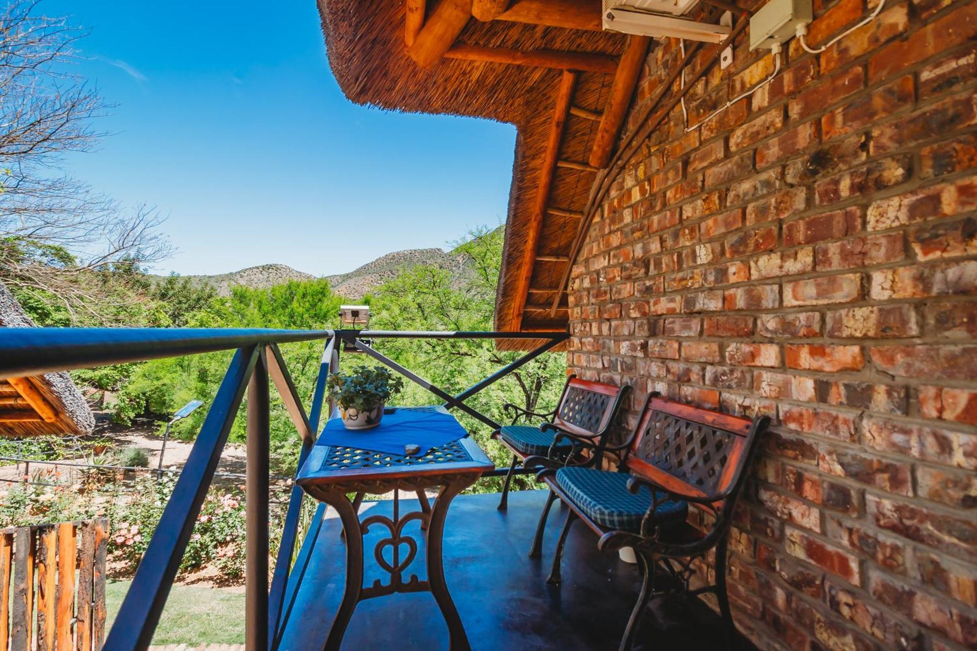 De Poort Country Lodge Oudtshoorn Kamer foto