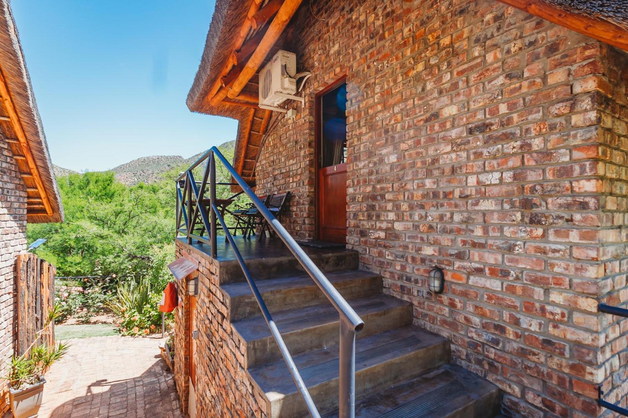 De Poort Country Lodge Oudtshoorn Kamer foto