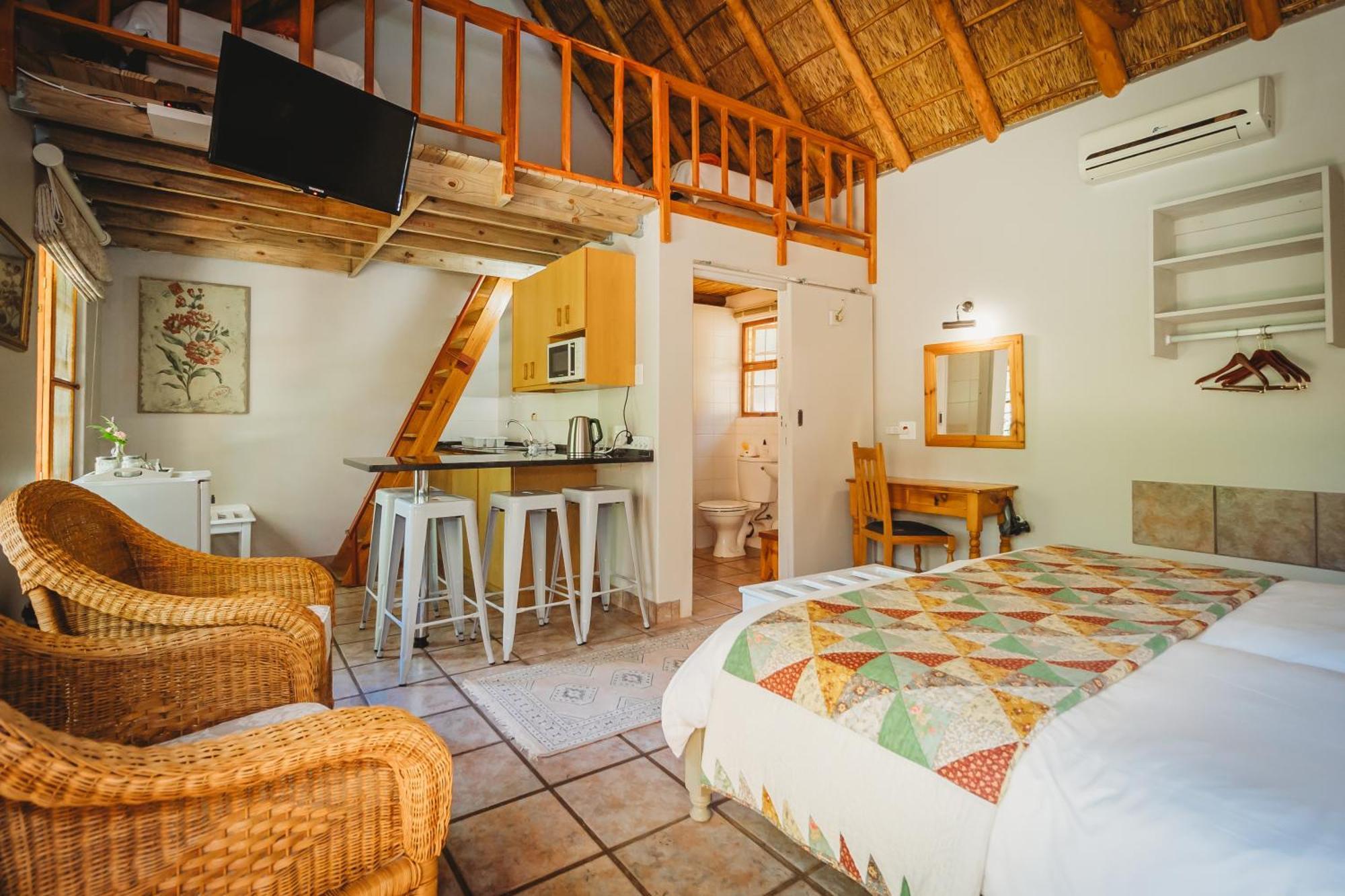 De Poort Country Lodge Oudtshoorn Kamer foto